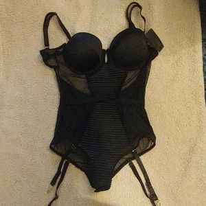 Bodysuit with garter attachments